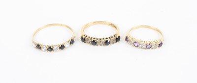 Lot 378 - A 9ct gold, blue and white sapphire set half...