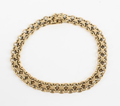 Lot 384b - A continental 18ct gold flatlink bracelet,...