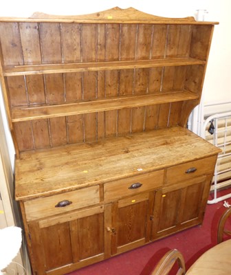 Lot 1218 - A Victorian pine kitchen dresser, having...