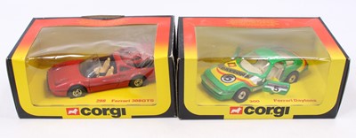 Lot 1242 - A Corgi Toys window box group of two Ferraris...