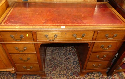 Lot 1235 - A circa 1900 walnut and gilt tooled burgundy...