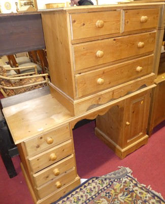 Lot 1267 - A modern pine kneehole dressing table, w.137cm;...