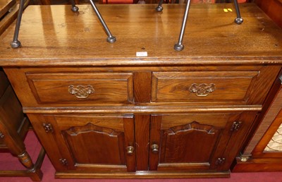 Lot 1296 - A contemporary joined oak side cupboard,...