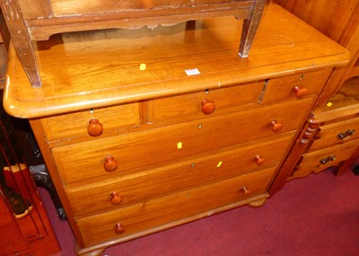 Lot 1308 - A hardwood round cornered chest of three short...