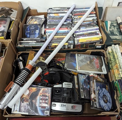 Lot 639 - Two boxes of mixed computer games, light sabre...