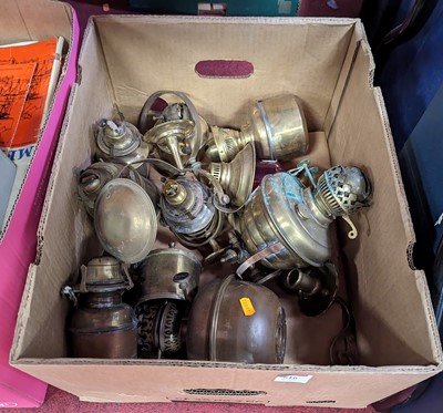 Lot 616 - A collection of brass oil lamp burners