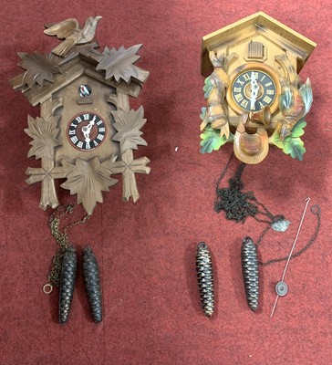 Lot 627 - Two Swiss wooden cuckoo clocks