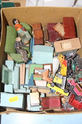 Lot 403 - A collection of toys to include diecast model...