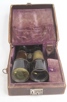 Lot 535 - A pair of vintage brass game binoculars, cased