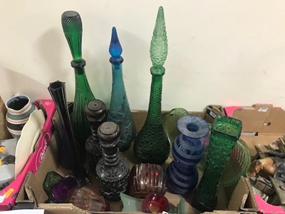 Lot 562 - A collection of coloured glass vases and bottles