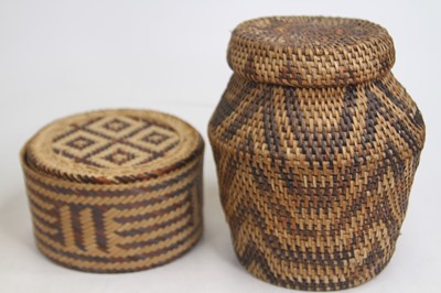 Lot 476 - A woven rattan basket and cover, h.18cm;...