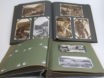 Lot 480 - Two albums of postcards