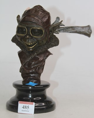 Lot 485 - A bronzed metal bust of a pixie dressed as a...