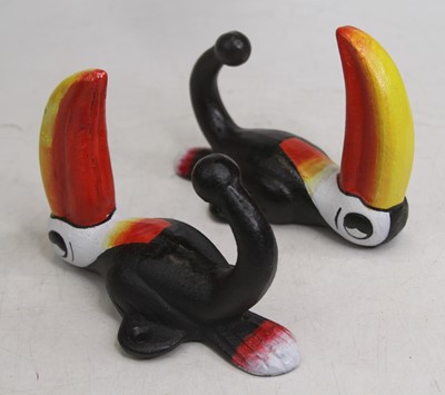 Lot 489 - A pair of novelty painted cast iron coat hooks...