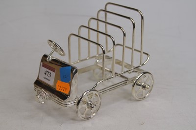 Lot 473 - A novelty silver plated toast rack in the form...