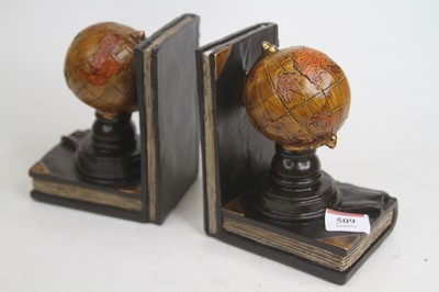 Lot 509 - A pair of novelty composite book-ends in the...