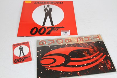 Lot 516 - An album of James Bond phone cards; together...