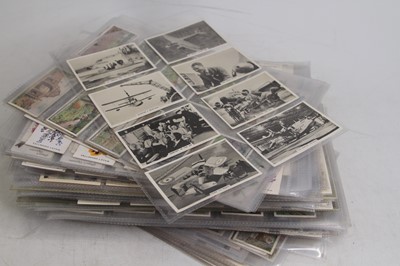 Lot 519 - A collection of cigarette cards, to include...