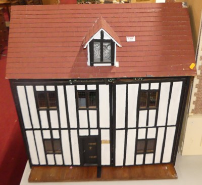 Lot 1405 - A mock Tudor child's doll's house, the...