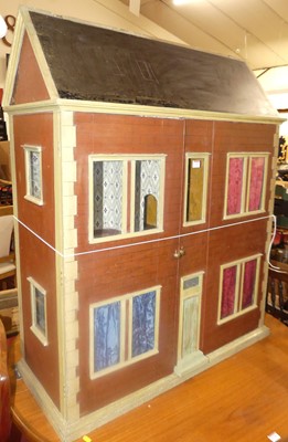 Lot 1329 - A two-storey dolls house, the twin hinged...