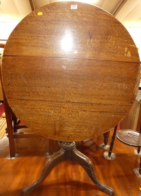 Lot 1335 - A 19th century provincial oak circular...