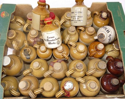 Lot 1425 - A collection of stoneware miniature whisky...