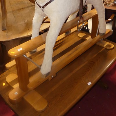 Lot 1341 - A plush upholstered child's rocking horse,...