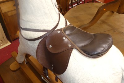 Lot 1341 - A plush upholstered child's rocking horse,...