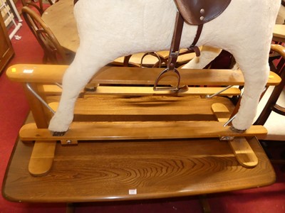 Lot 1341 - A plush upholstered child's rocking horse,...