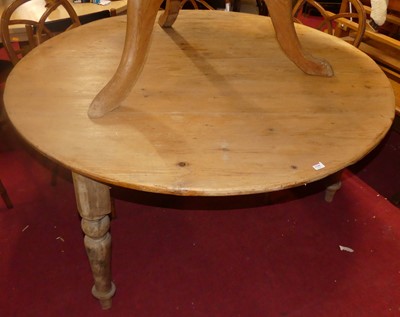 Lot 1344 - A large rustic pine circular pub dining table,...