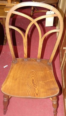 Lot 1345 - A set of six elm hoop-backed kitchen chairs,...