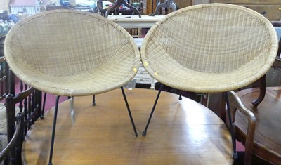 Lot 1352 - A pair of vintage 1960s wicker satellite...