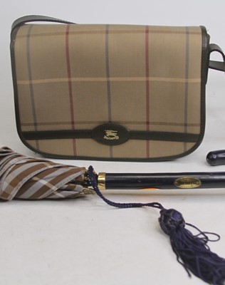 Lot 537 - A Ladies Burberry checked handbag with...