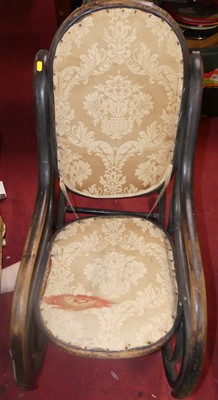 Lot 1369 - A Thonet stained bentwood rocking elbow chair,...