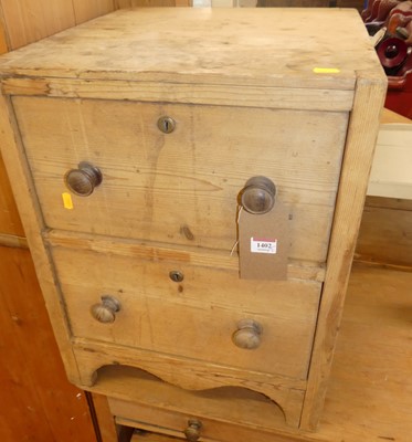 Lot 1402 - A small rustic pine low two drawer 'cube'...