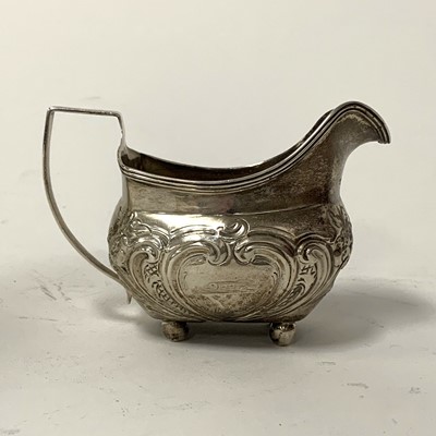 Lot 308 - A George III silver cream jug, of bombe form,...