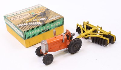 Lot 1717 - A Crescent Toys No. 1804 tractor & disc harrow...