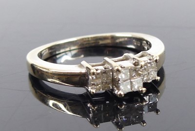 Lot 2743 - An 18ct white gold diamond tiered quatrefoil...