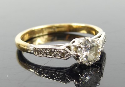 Lot 2694 - A yellow and white metal, diamond solitaire...