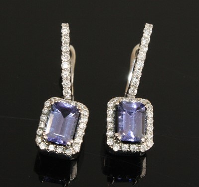 Lot 2702 - A pair of white metal, tanzanite and diamond...