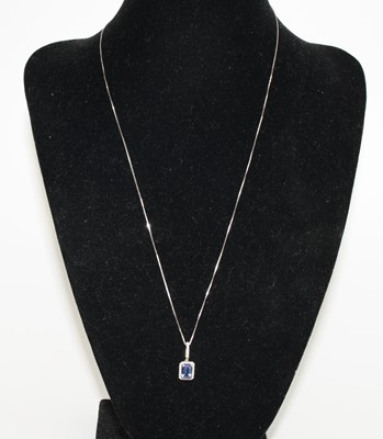 Lot 2703 - A white metal, tanzanite and diamond...