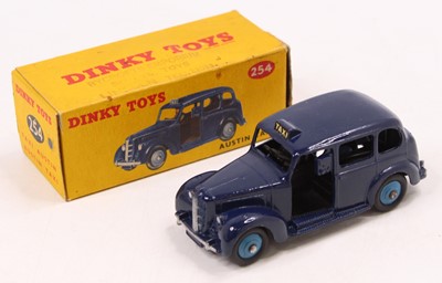 Lot 1371 - Dinky toys, 254 Austin Taxi, In dark blue body...