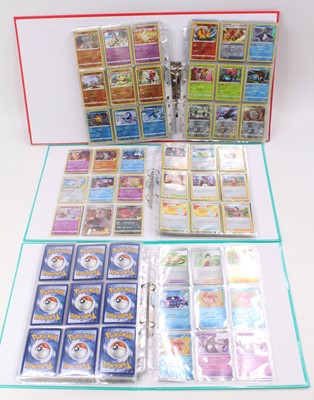 Lot 1870 - Three binders of a variety of Modern Pokemon...