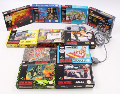 Lot 1889 - 11 Super Nintendo Entertainment System boxed...