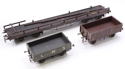 Lot 112 - Three Gauge 1 wooden goods wagons, LMS bogie...