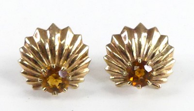 Lot 2718 - A pair of yellow metal citrine sunburst design...