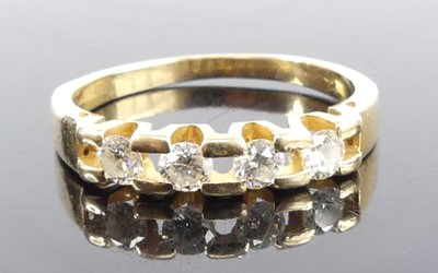 Lot 2733 - A yellow metal diamond half hoop eternity ring,...