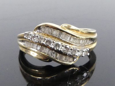 Lot 2746 - A 9ct yellow and white gold, diamond five-row...