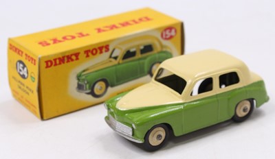 Lot 1275 - A Dinky Toys No. 154 Hillman Minx saloon,...