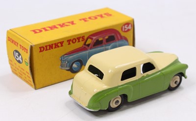 Lot 1356 - A Dinky Toys No. 154 Hillman Minx saloon,...